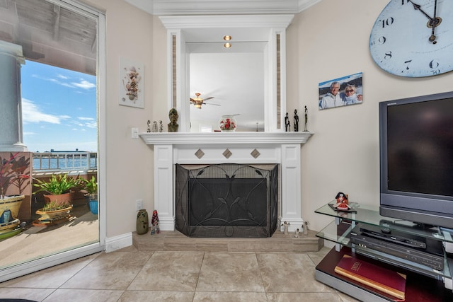 tiled living room with a wealth of natural light and ornamental molding