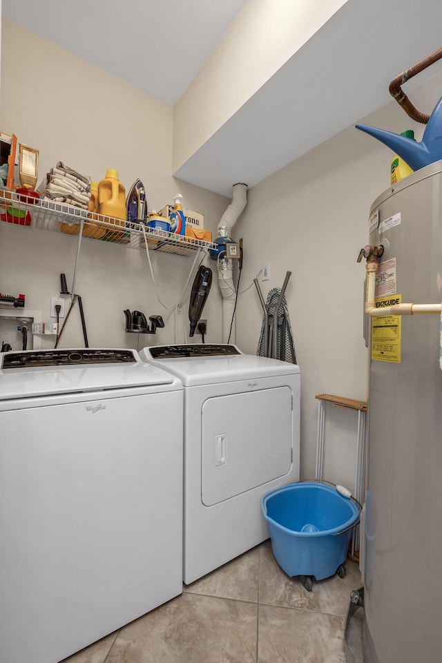 laundry area with independent washer and dryer, washer hookup, electric dryer hookup, electric water heater, and light tile floors