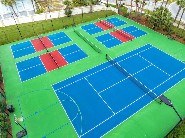 view of sport court with basketball hoop