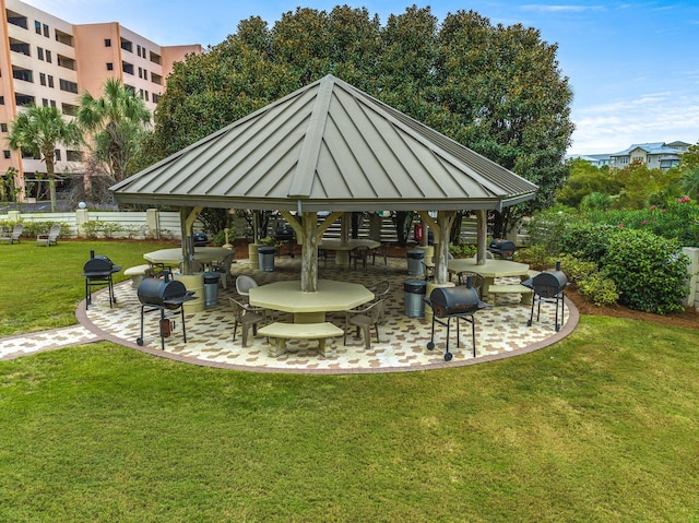 view of nearby features with a patio, a gazebo, and a lawn