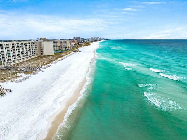 aerial view with a view of the beach and a water view