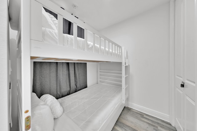 bedroom featuring hardwood / wood-style flooring