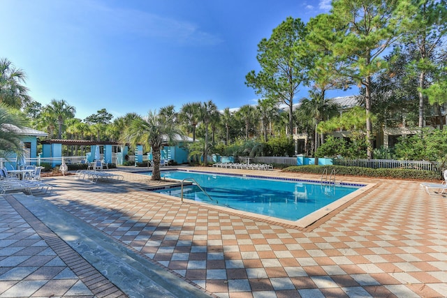 view of swimming pool featuring a patio