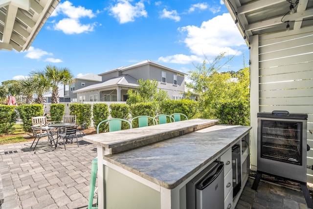 view of patio / terrace featuring wine cooler