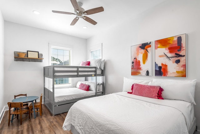 bedroom featuring ceiling fan and dark hardwood / wood-style floors