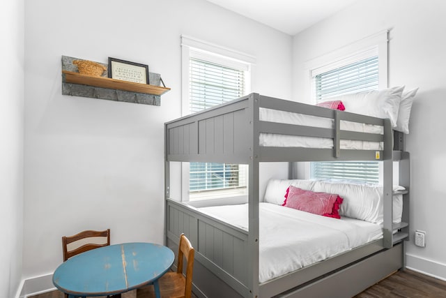 bedroom featuring dark hardwood / wood-style flooring