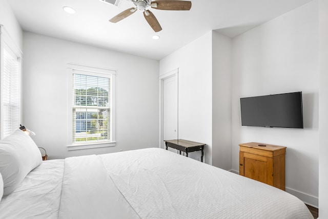 bedroom featuring ceiling fan