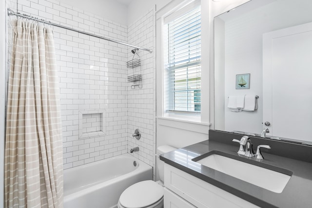 full bathroom featuring shower / tub combo, toilet, and large vanity