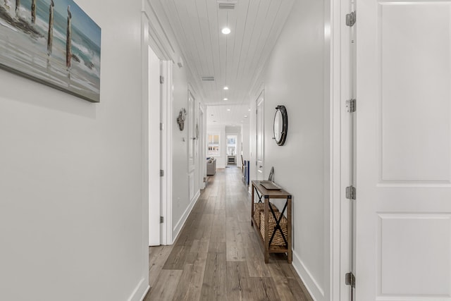 corridor featuring hardwood / wood-style flooring