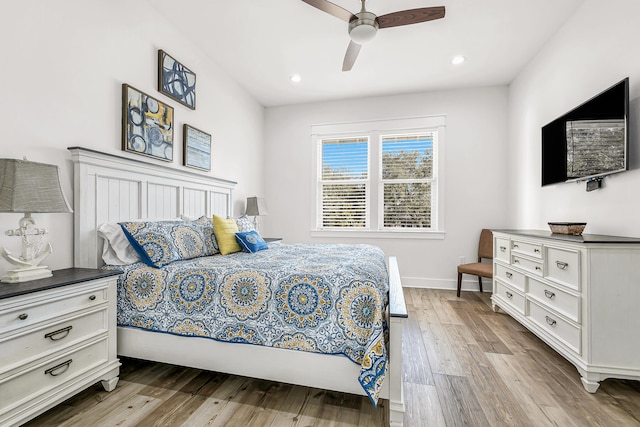 bedroom featuring ceiling fan and hardwood / wood-style floors