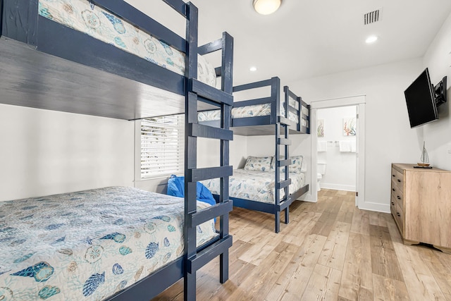 bedroom featuring light hardwood / wood-style floors