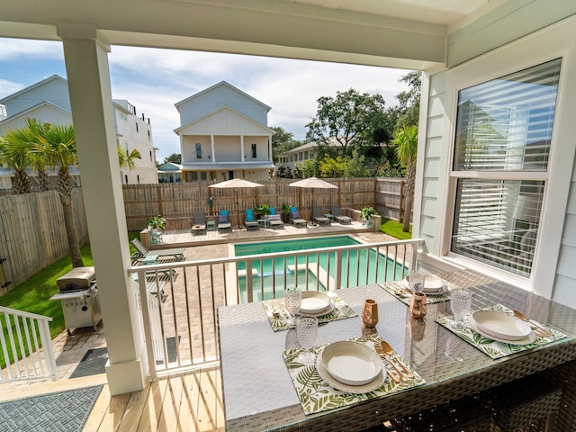 view of swimming pool with a patio area