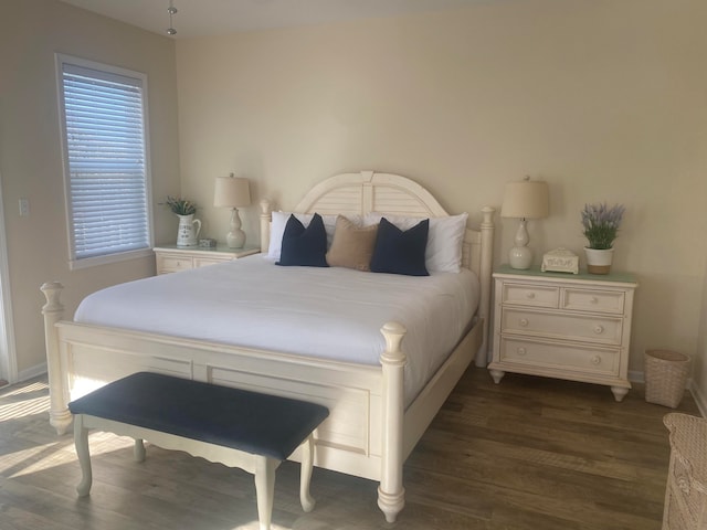 bedroom featuring dark hardwood / wood-style floors