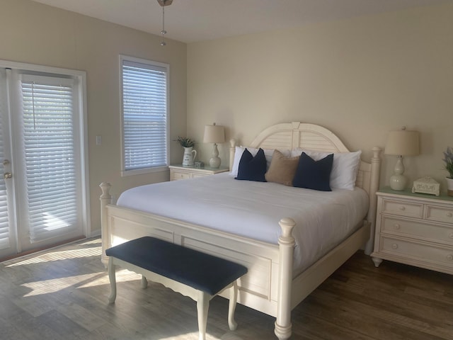 bedroom featuring dark hardwood / wood-style floors