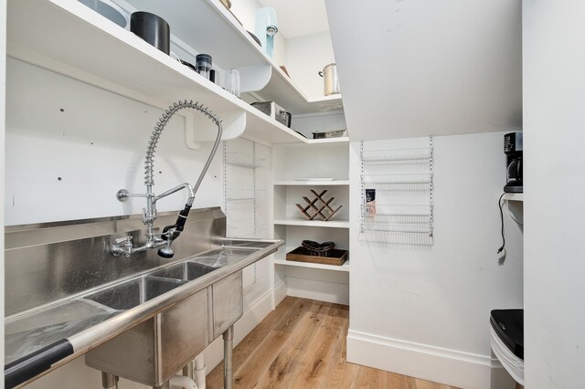 spacious closet featuring light wood-type flooring