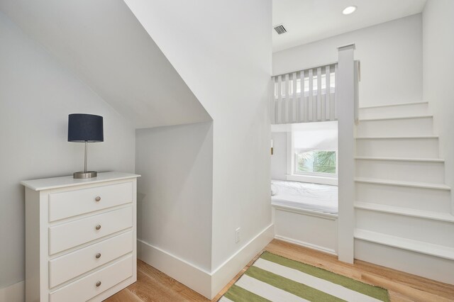 unfurnished bedroom with light wood-type flooring