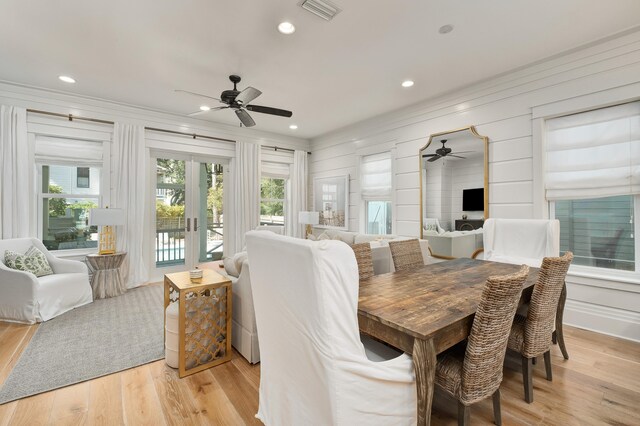 dining room featuring french doors, ceiling fan, and light hardwood / wood-style floors