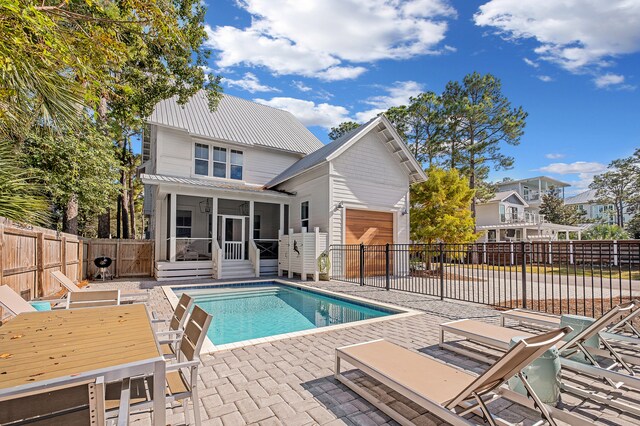 view of pool with a patio area