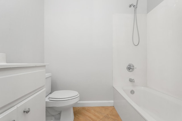 full bathroom featuring bathtub / shower combination, vanity, toilet, and tile flooring