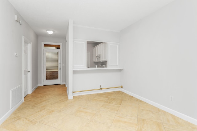 empty room with light tile floors