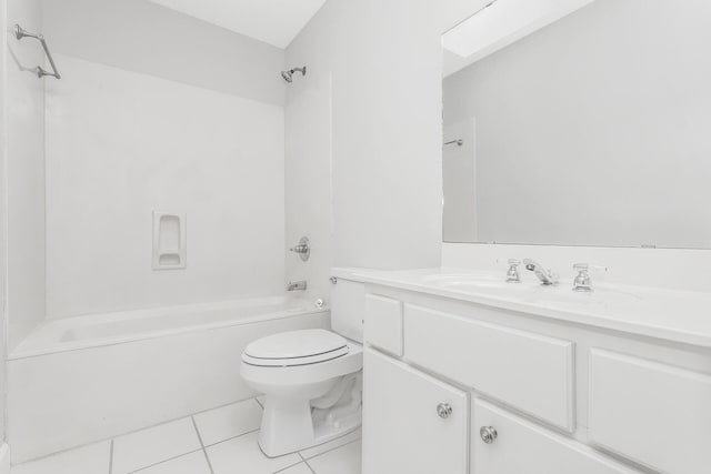 full bathroom featuring washtub / shower combination, vanity, tile floors, and toilet