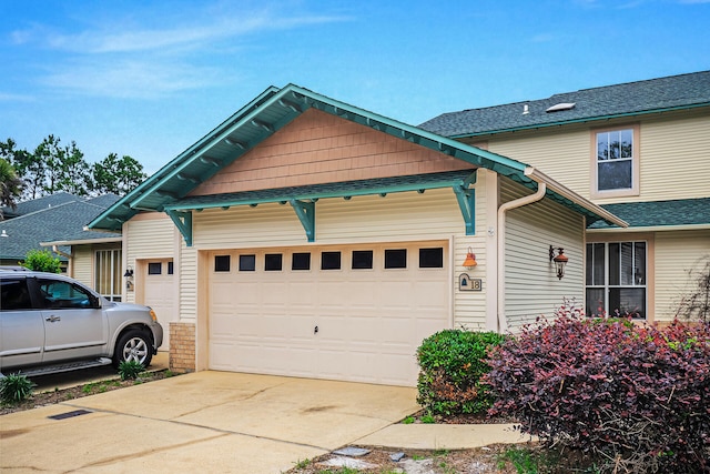 view of front of property featuring a garage