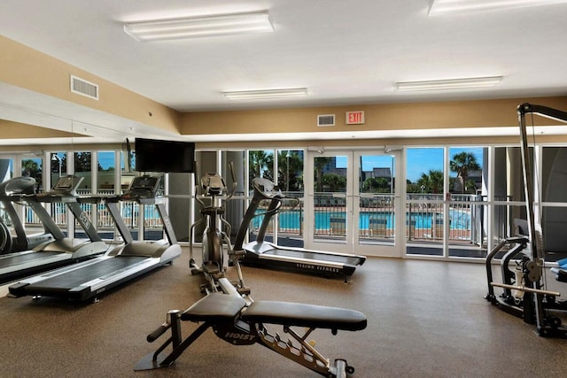 gym with french doors