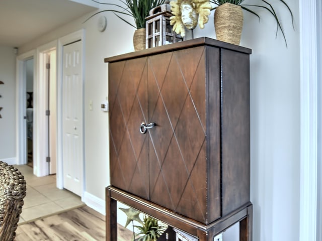 interior details with light tile flooring