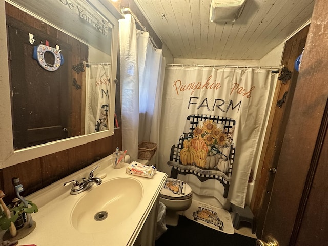 bathroom with oversized vanity and toilet