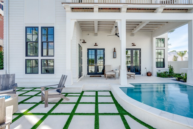 exterior space featuring french doors, ceiling fan, and a patio area