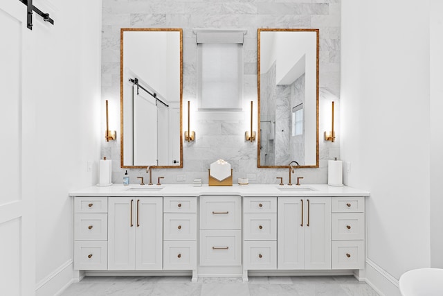 bathroom featuring tile walls, tile floors, and dual bowl vanity