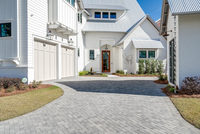 view of front of property with a garage