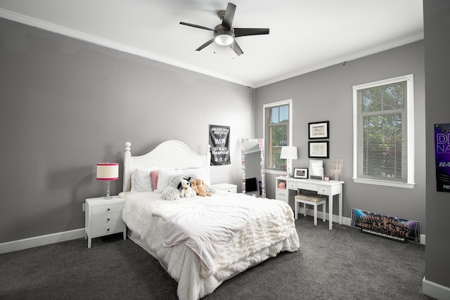 bedroom with dark carpet, ornamental molding, and ceiling fan