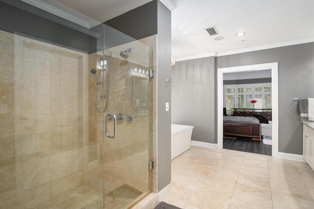 bathroom with crown molding, vanity, and an enclosed shower