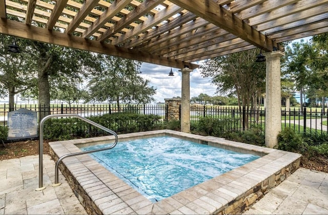 view of pool featuring a hot tub and a pergola