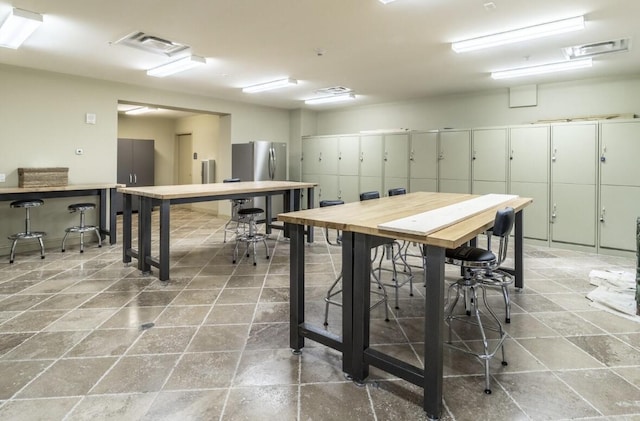 dining room with a workshop area