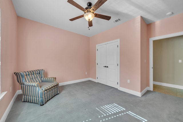 unfurnished room featuring carpet and ceiling fan