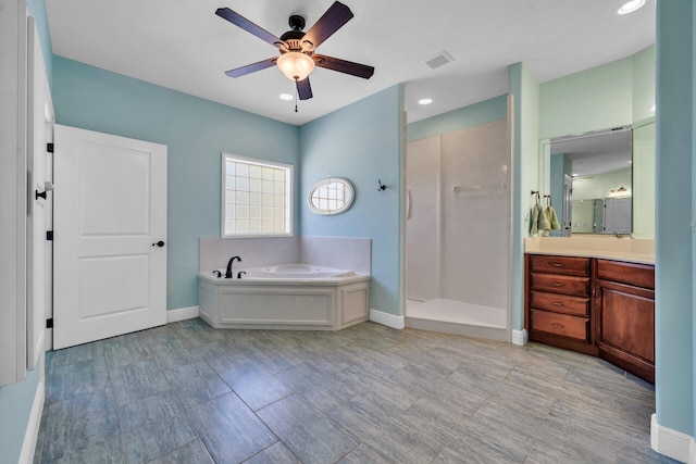 bathroom featuring shower with separate bathtub, vanity, and ceiling fan