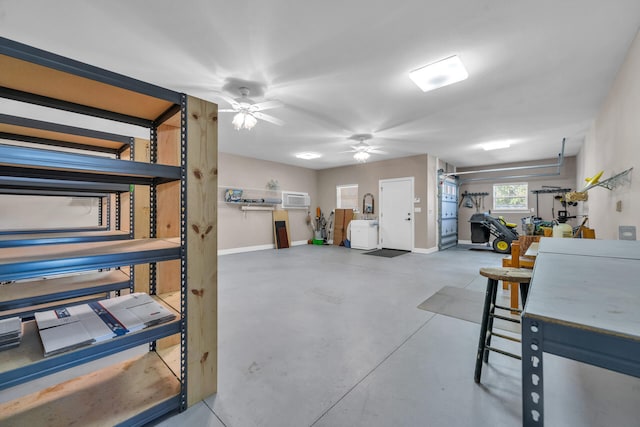 interior space featuring a wall mounted AC, ceiling fan, and concrete flooring