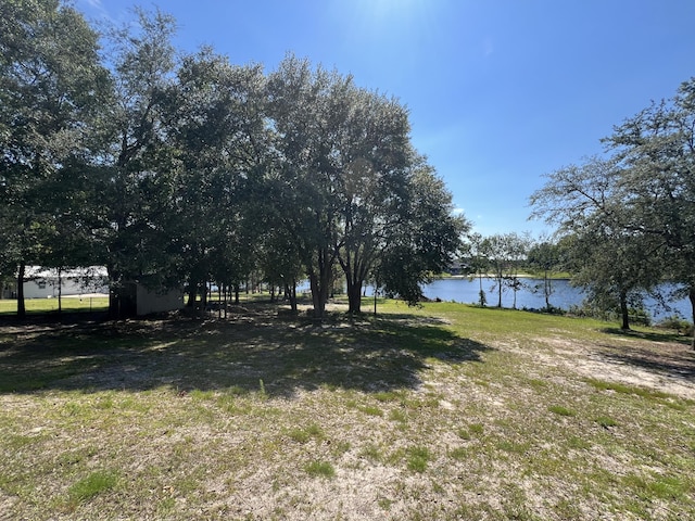 view of yard with a water view