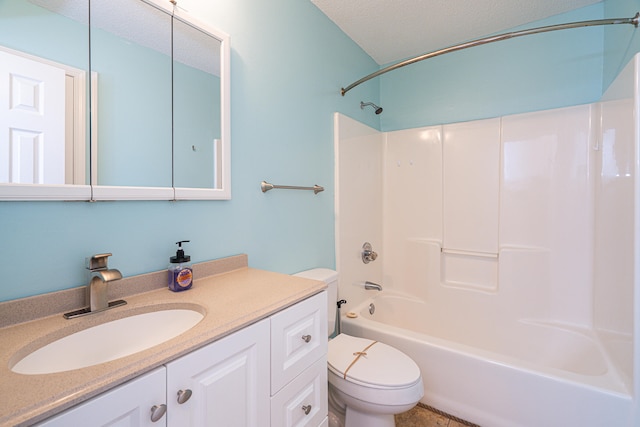 full bathroom with shower / bath combination, vanity, toilet, and a textured ceiling