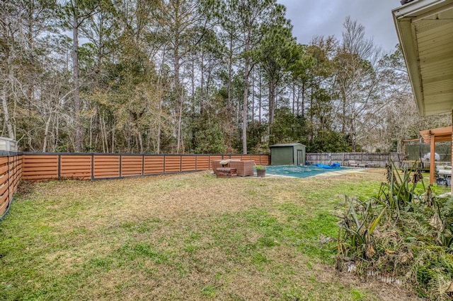 view of yard featuring a storage shed