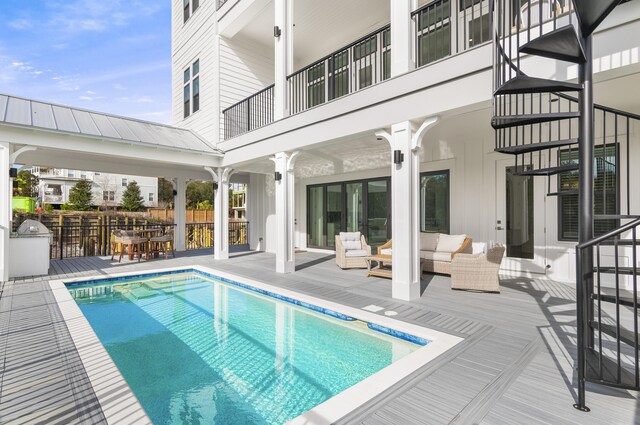 view of pool with outdoor lounge area