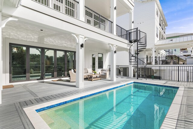 view of swimming pool with outdoor lounge area