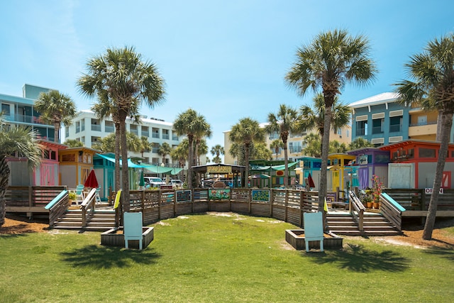 exterior space with a yard and a playground