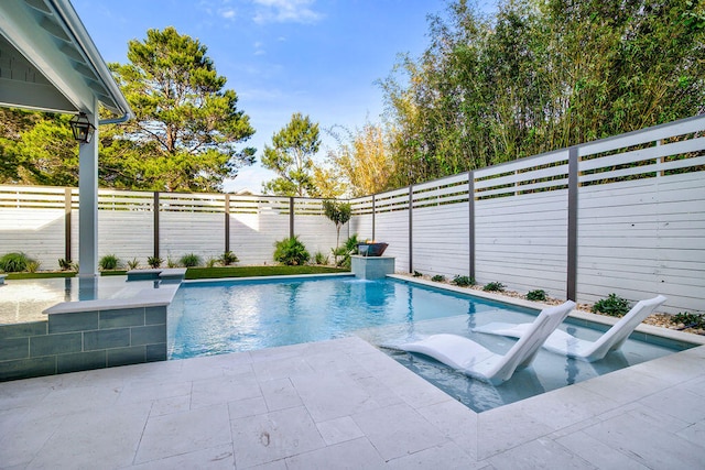 view of pool with a patio