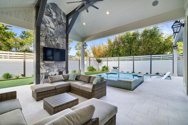 view of patio / terrace featuring an outdoor living space, ceiling fan, and a swimming pool with hot tub