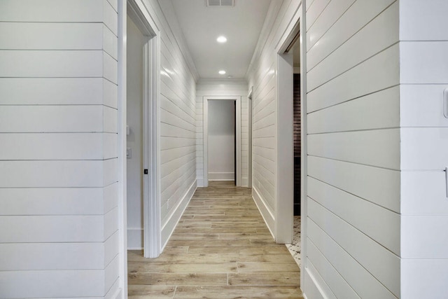 corridor featuring light hardwood / wood-style floors