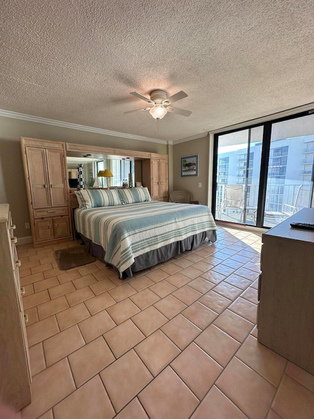 tiled bedroom with ornamental molding, ceiling fan, access to outside, and a textured ceiling