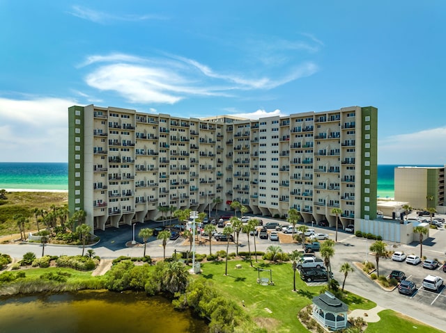 view of building exterior with a water view